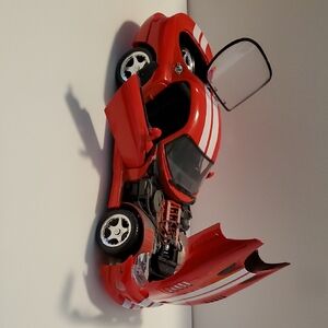 Speedy Red Toy Sports Car with Opening Doors